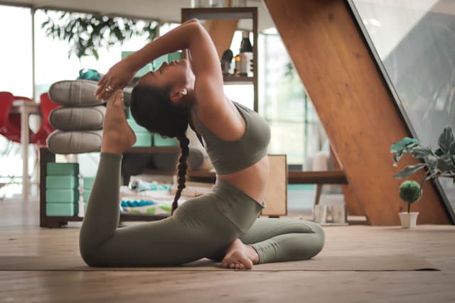 Student practising seated pranayama breathing